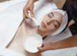 woman applying cosmetic alginate mask scaled